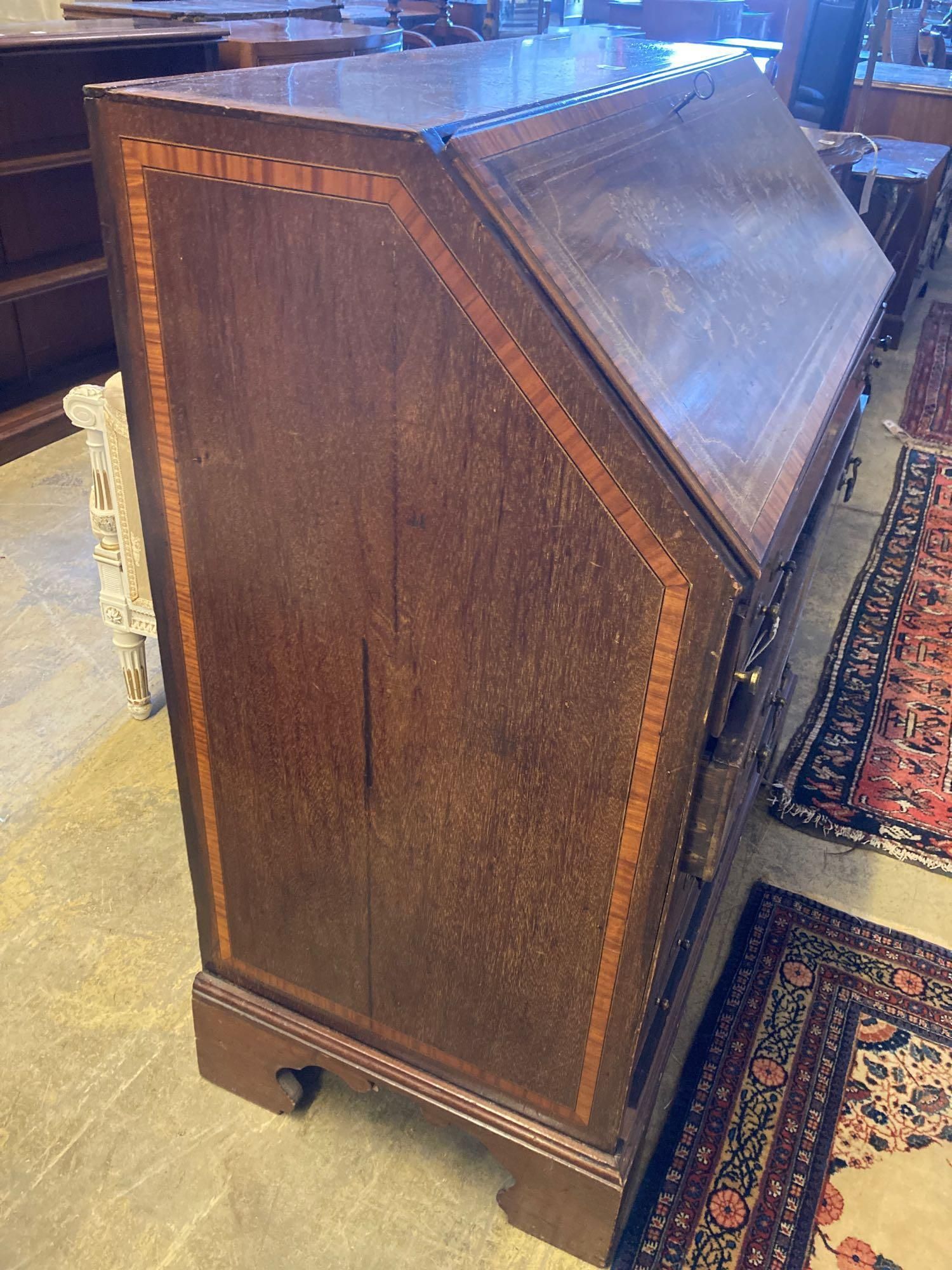 An Edwardian marquetry inlaid mahogany bureau, width 92cm